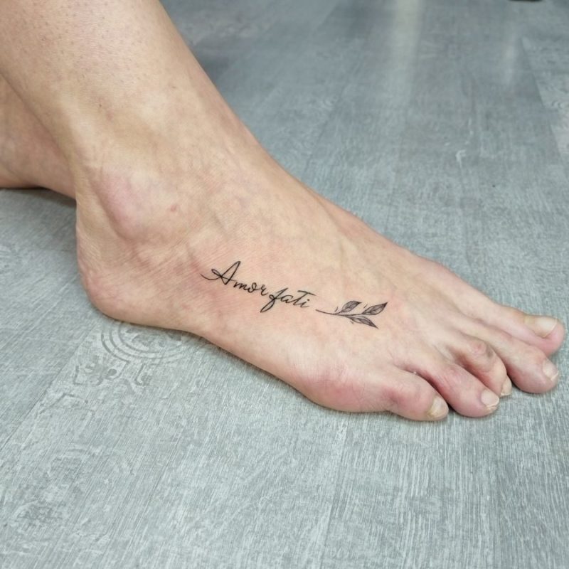 Тату надпись